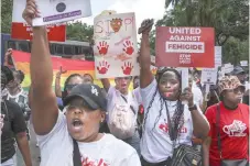  ?? ?? Activists march as they demonstrat­e in the Central Business District against an alarming rise in murders of young women in Nairobi.