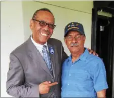  ?? SUBMITTED IMAGE ?? Algernon Ward (left), a candidate in the June 12 runoff for North Ward council, receives the endorsemen­t from incoming At-Large Councilman Santiago Rodriguez.