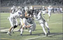  ?? PHOTO BY JOSIE LEPE ?? St. Francis Viliami Teu (4) runs with the ball against Valley Christian during the second half of a high school football game at St. Francis High in Mountain View on Oct. 8.