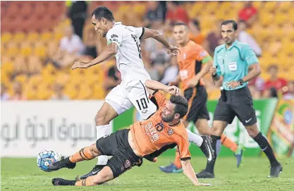  ??  ?? Muang Thong’s Teerasil Dangda, No.10, in action against Brisbane Roar.