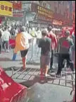  ?? AP ?? People protest in Guangzhou, China, in this image obtained from a video.