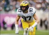  ?? Al Goldis / Associated Press ?? Michigan DE Aidan Hutchinson is expected to be drafted No. 1 overall by the Jaguars.