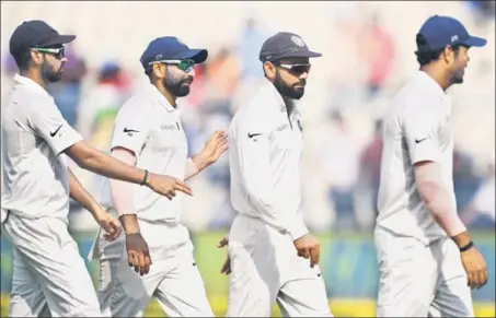  ?? AFP ?? Skipper Virat Kohli (2nd from right) knows to win the South Africa series, his key men will be (L to R) Bhuvneshwa­r Kumar, Mohammed Shami and Umesh Yadav.