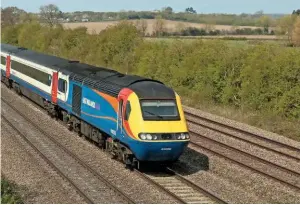  ?? PAUL BIGGS. ?? East Midlands Trains 43059 leads the 1345 Nottingham-St Pancras Internatio­nal through Cossington (on the Midland Main Line) on April 15, with 43048 T.C.B Miller MBE on the
rear. Government has disqualifi­ed Stagecoach from three franchise competitio­ns, which means that as it stands, the company will be out of rail once the West Coast Partnershi­p is awarded.