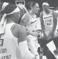  ?? CHASE STEVENS/AP ?? Mercury guard Diana Taurasi (3) celebrates with teammates after they defeated the Aces 87-84 in Game 5 of a WNBA semifinal series Friday in
Las Vegas.