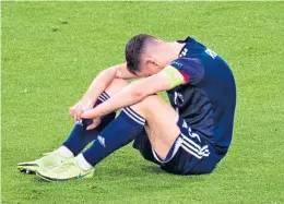  ??  ?? Last Tuesday’s exit following the defeat by Croatia was hard for Scotland captain Andy Robertson to take, just as it was for Tartan Army members inside Hampden and at the fanzone on Glasgow Green