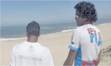  ?? Photo: Happy Home Trust ?? Sam and Sujit taking a rest from cycling the Camino Way, on the beach in Portugal