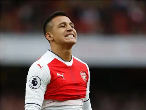  ??  ?? Alexis Sanchez reacts after missing a chance for Arsenal (Getty)