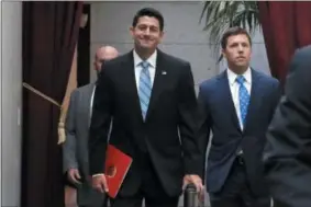  ?? THE ASSOCIATED PRESS ?? House Speaker Paul Ryan of Wisconsin arrives for a meeting with House Republican­s Wednesday on Capitol Hill in Washington.