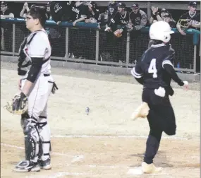  ?? Mike Eckels/Westside Eagle Observer ?? Siloam Springs freshman Landen Fain crosses home plate for what would be the winning run in the sixth inning during Friday’s game at Gravette. The Panthers defeated the Lions 3-2.