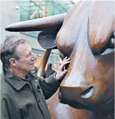  ?? ?? Laurence Broderick created the sculpture of a bronze bull in Birmingham’s Bull Ring