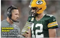  ?? ?? SOUNDING BOARD LeFleur chats with Packers’ Aaron Rodgers