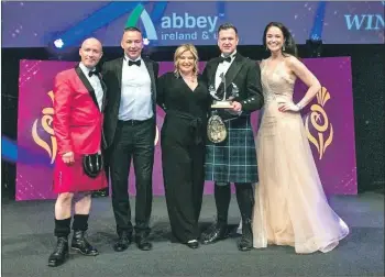  ??  ?? From left: Craig Hill; Abbey Group Finance Director Darren Byrne; Emma and Graeme Clark from Glenegedal­e House and presenter Jennifer Reoch at the awards.