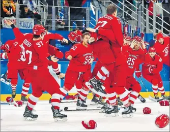  ?? REUTERS ?? ▪ The Russian team celebrate winning the gold after their 43 victory against Germany in the ice hockey final on Sunday.