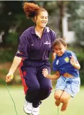  ??  ?? Role model: Black Ferns wing Louisa Wall on a school visit