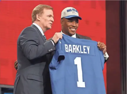  ?? MATTHEW EMMONS/USA TODAY ?? The Giants selected running back Saquon Barkley with the second pick Thursday in the draft.