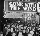  ?? ASSOCIATED PRESS FILE PHOTO ?? In this Dec. 19, 1939 file photo, a crowd gathers outside the Astor Theater on Broadway during the premiere of “Gone With the Wind” in New York. HBO Max has temporaril­y removed “Gone With the Wind” from its streaming library in order to add historical context to the 1939film long criticized for romanticiz­ing slavery and the Civil War-era South.