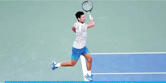  ?? — AFP ?? MASON: Novak Djokovic of Serbia returns a shot to Sam Querrey of the United States during Day 4 of the Western and Southern Open at Lindner Family Tennis Center in Mason, Ohio.