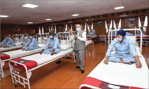  ??  ?? Prime Minister Narendra Modi visits an army hospital in Ladakh.
