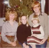  ??  ?? Darlene and Dave Phillips with their daughters, Kelley, left, and Jennifer, at Christmas 1978.