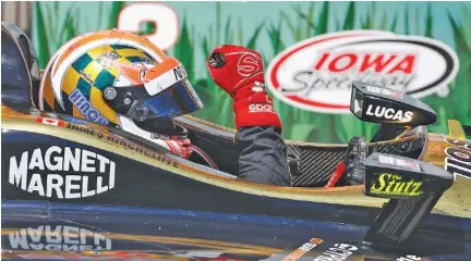  ?? THE ASSOCIATED PRESS ?? James Hinchcliff­e celebrates after winning Sunday’s IndyCar race at Iowa Speedway. It was Hinchcliff­e’s second victory at the oval short track in Newton, but his first win anywhere since April 2017.