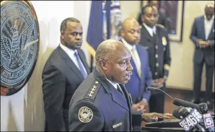  ?? SPINK / JSPINK@AJC.COM ?? Atlanta Police Chief George Turner (front) said of the city’s effort with General Electric, “I am confident that this partnershi­p will be a vital component to APD’s overall policing strategy.”JOHN