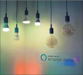  ?? Jae C. Hong Associated Press ?? WIZ’S smart LED lights, shown at CES Internatio­nal in Las Vegas in January, are controlled by verbal commands through Amazon’s Alexa or Google Home.