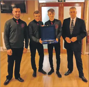  ??  ?? Joint winners of the Lochside Rovers Jamie Kerr Player of the Year award were Craig Easton and Daniel Sloss. They were presented with the award by Jamie’s father John and brother Jordan.