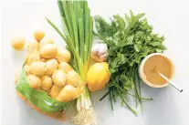  ?? ?? Potatoes, scallions, lemon, garlic and herbs are used in a tahini potato salad.