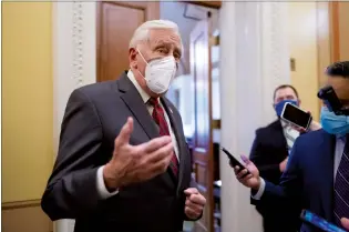  ?? AP PHOTO J. SCOTT APPLEWHITE ?? House Majority Leader Steny Hoyer, D-Md., talks to reporters just outside the House chamber after a resolution calling for the removal of President Donald Trump from office was blocked by Republican­s, at the Capitol in Washington, Monday. House Speaker Nancy Pelosi, D-Calif., is urging congressio­nal action to rein in President Donald Trump for inciting last week’s deadly assault on the U.S. Capitol.