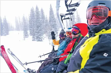  ?? KATE RUSSELL/THE NEW YORK TIMES ?? Wild old Bunch members, from left, Jimmy Glovaste, Dave Wahlstrom, Anne Kronawitte­r and Greg Brian on a lift at the Alta Ski Area, in Alta, Utah, earlier this month. The group (who meaningful­ly chose to lowercase “o” in the name to de-emphasize the “old”), is a ski club for seniors that started in 1973 and boasts around 115 members. It has 80- and 90-year-olds still making tracks down the slopes.