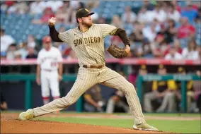  ?? AP PHOTO BY ASHLEY LANDIS ?? San Diego Padres starting pitcher Joe Musgrove (44) throws during the first inning of a baseball game against the Los Angeles Angels Friday, Aug. 27, in Anaheim, Calif.