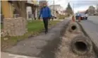  ?? JACK LAKEY/TORONTO STAR ?? The asphalt on this Finch Ave. sidewalk will quickly crumble when winter salting begins.