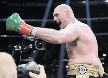  ?? Picture: AFP ?? RUNNING SHOES ON. Briton Tyson Fury (above) does not think Deontay Wilder will want a rematch any time soon.