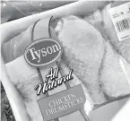  ?? DANIEL ACKER BLOOMBERG NEWS ?? A package of Tyson Foods chicken sits in May in Tiskilwa, Illinois. The biggest difference between the store-brand chickens at Whole Foods and what’s for sale at another supermarke­t is, in many cases, the sticker price itself.