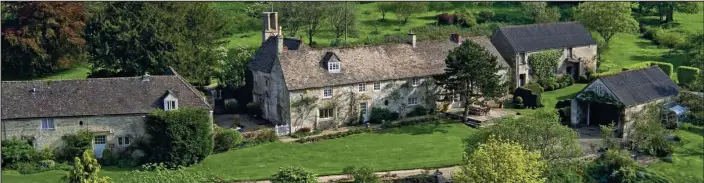  ??  ?? Cottage garden idyll: An aerial view of Miss Allen’s six-bedroom house in Gloucester­shire, which includes two barns, an outdoor swimming pool and its own tennis courts