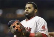  ?? THE ASSOCIATED PRESS ?? Boston Red Sox third baseman Pablo Sandoval heads to the dugout at the end of the seventh the inning.