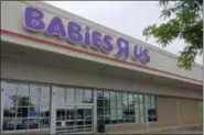  ?? BETSY SCOTT — THE NEWS-HERALD ?? The vacant Babies R Us store and the rest of Mentor City Shopping Center is targeted for facade renovation­s.