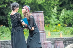  ?? DAHLIA KATZ ?? Ximena Huizi, left, and Sochi Fried in Rosalynde, Driftwood Theatre's reimaginin­g of As You Like It.