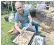  ??  ?? Marc Allum, the Antiques Roadshow valuation expert, displays some of the Roman finds from his garden dig