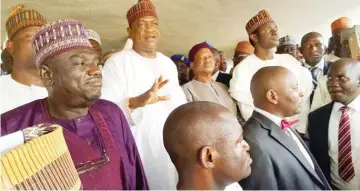  ??  ?? Gov. Ibrahim Gaidam of Yobe State (2nd left), speaks to his supporters shortly after the Yobe. Governorsh­ip Election Petition Tribunal upheld his election as duly elected governor of the state, in Abuja yesterday