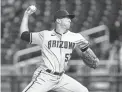  ?? ALEX BRANDON/AP ?? Diamondbac­ks starting pitcher Taylor Widener throws during the third inning against the Washington Nationals at Nationals Park Friday in Washington.