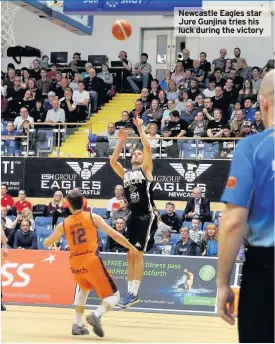  ??  ?? Newcastle Eagles star Jure Gunjina tries his luck during the victory