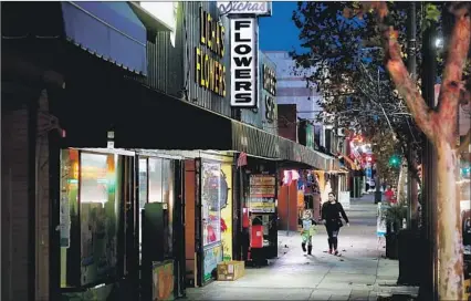  ??  ?? STORES line North Broadway in Lincoln Heights, where ICE’s arrest of a father last year put the immigrant community on edge.