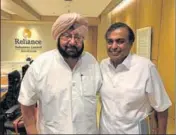  ??  ?? Chief minister Capt Amarinder Singh with chairman of Reliance Industries Limited Mukesh Ambani in Mumbai on Tuesday. HT PHOTO