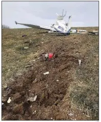  ?? AP ?? The wreckage from a plane crash is shown Saturday in this photo provided by the sheriff’s office in Guthrie County, Iowa.