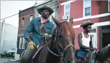  ?? AARON RICKETTS/NETFLIX ?? (L-r) Idris Elba as Harp and Caleb McLaughlin as Cole in “Concrete