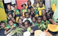  ?? BROWN/PHOTOGRAPH­ER RUDOLPH ?? Students at Faith Preschool in Denham Town, west Kingston, learn about local foods during Jamaica Day activities, yesterday.