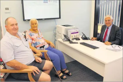  ??  ?? NEW DIGS: Professor George Kannouraki­s greeted his Wimmera Cancer Centre in Horsham. first patients, John and Audrey Klemm, at