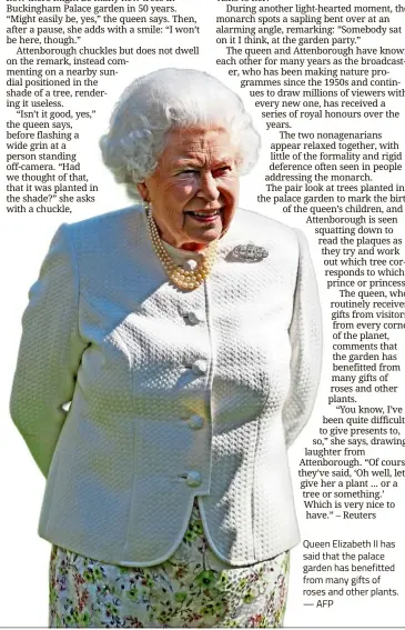  ?? —AFP ?? Queen Elizabeth II has said that the palace garden has benefitted from many gifts of roses and other plants.